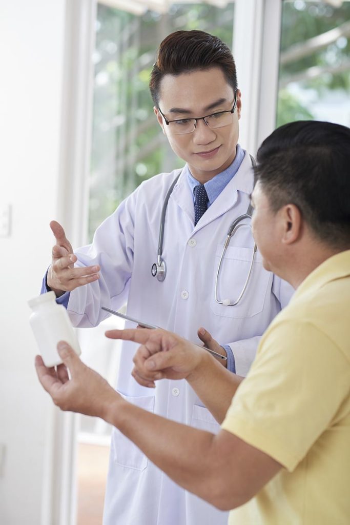 Doctor talking to patient